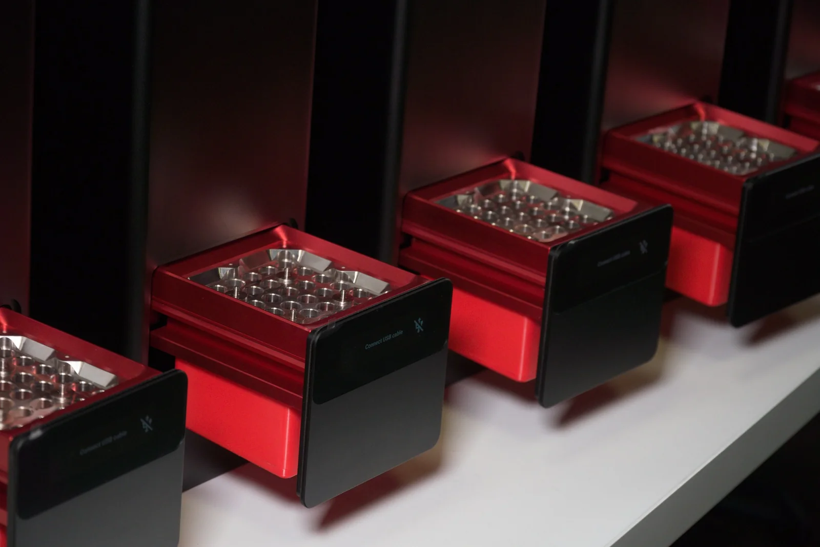 A lineup of PewCB One desktop PCB prototyping machines