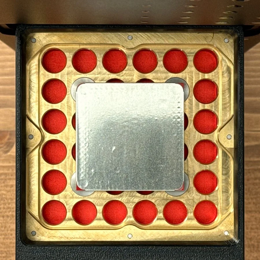 A solder-paste stencil sheet attached to a PCB blank