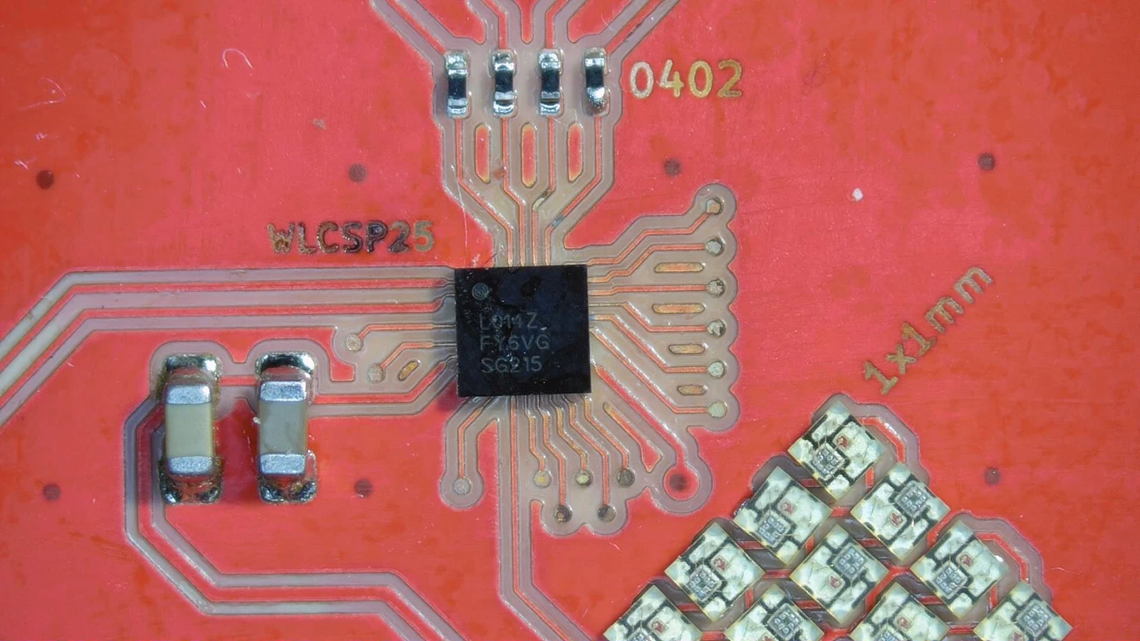 An assembled WLCSP25 BGA and a matrix of 1 × 1 mm addressable LEDs